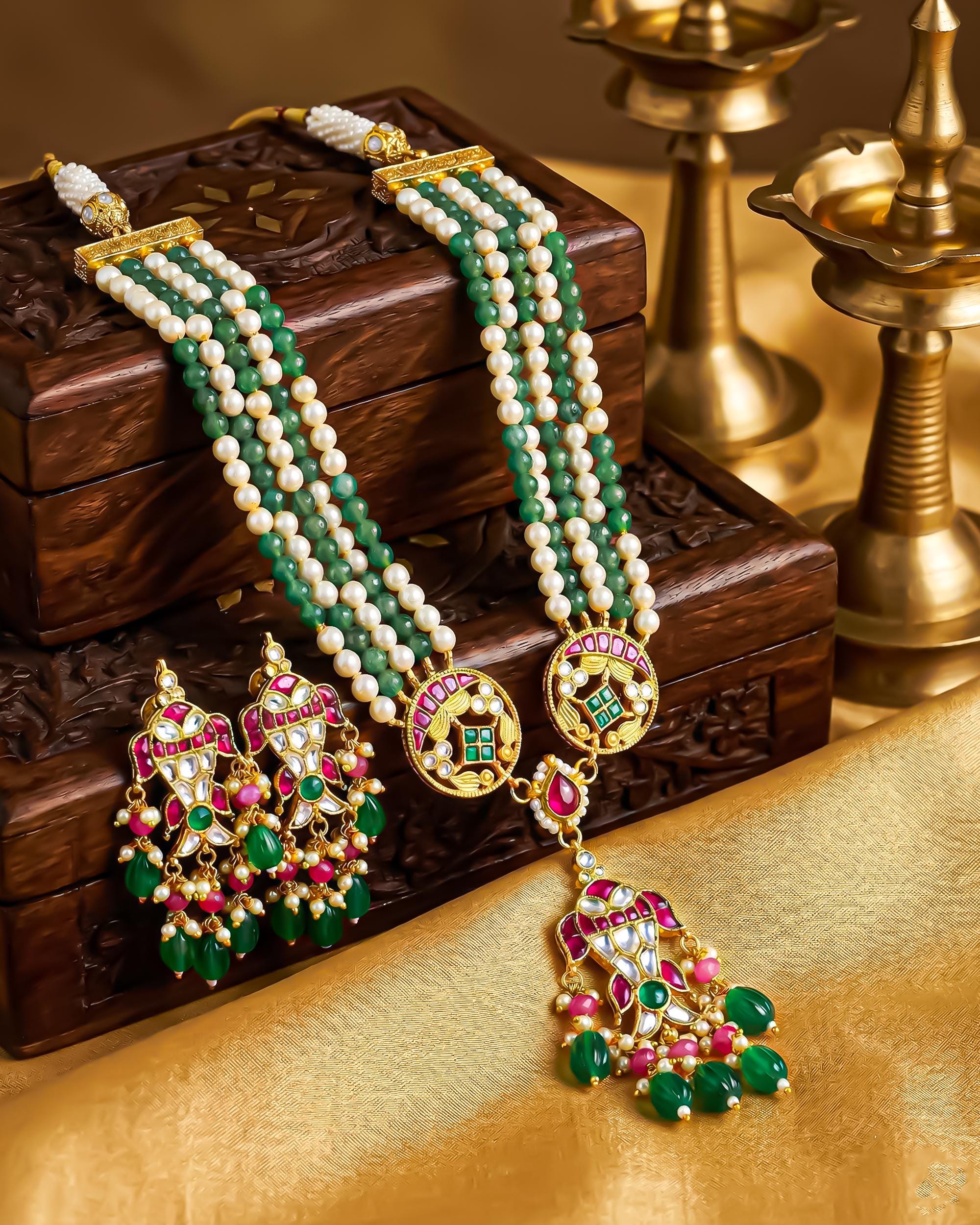 Multi-Strand Green Pearl Kundan Necklace Set with Pink Stone Pendant, Earrings, Maang Tikka