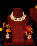 Antique Gold-Plated Pachi Kundan Crescent Choker Set with Rich Pearl Fringes